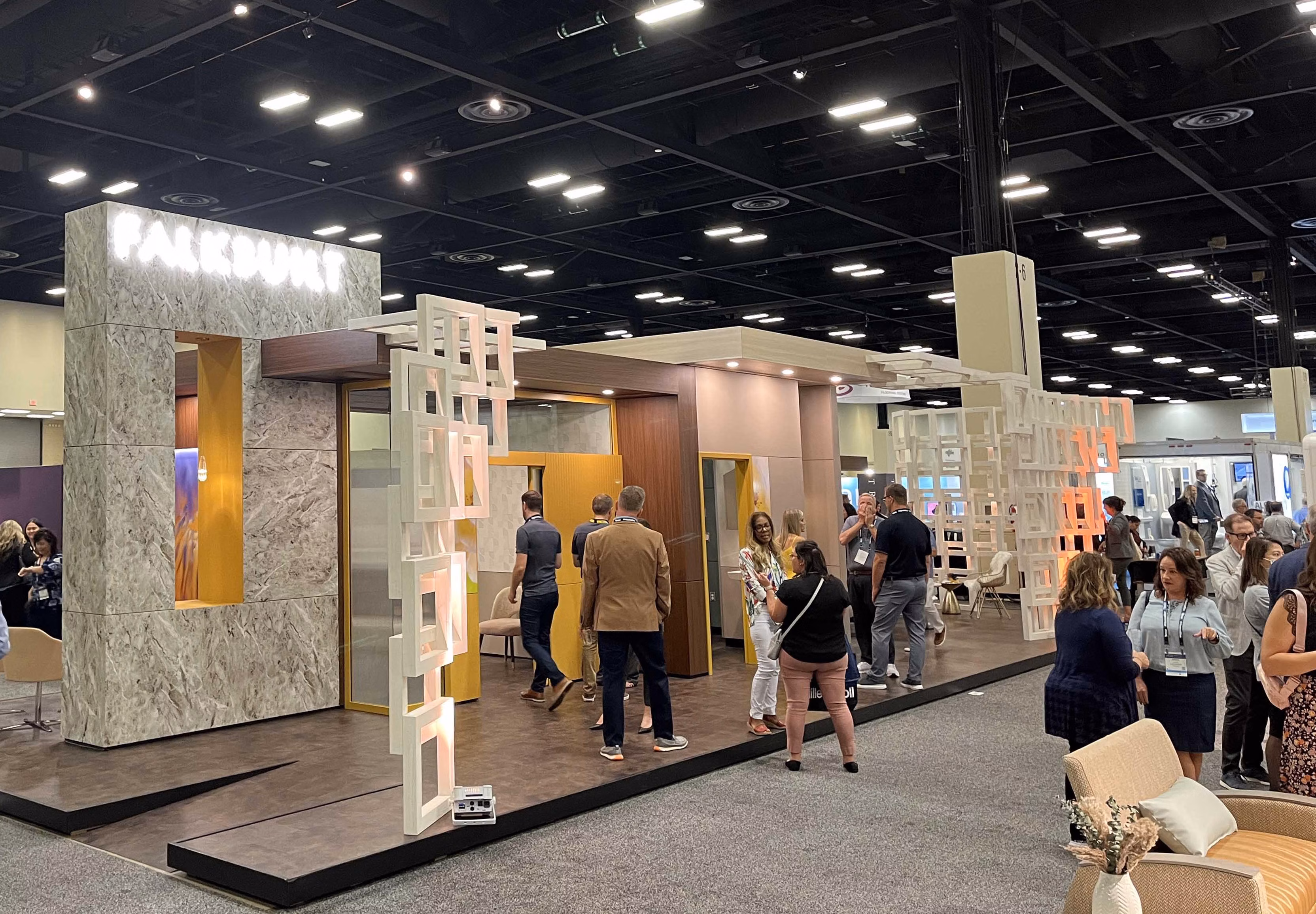 healthcare professionals visit Falkbuilt at Healthcare Design Expo and Conference
